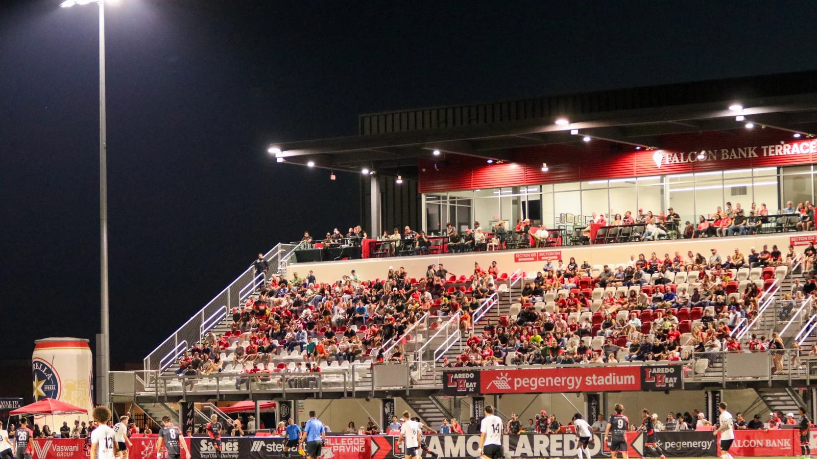 Supporters and players at a Laredo Heat match at PEG Energy Stadium